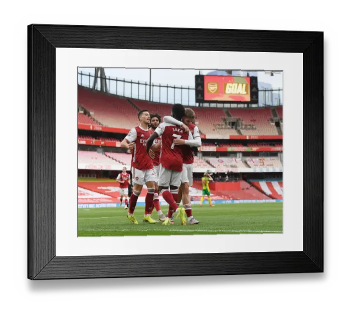 Framed Print : Arsenal's Smith Rowe, Martinelli, and Saka Celebrate First Goal Amid Empty Emirates Stadium (2021) Framed Print : Arsenal's Smith Rowe, Martinelli, and Saka Celebrate First Goal Amid Empty Emirates Stadium (2021)