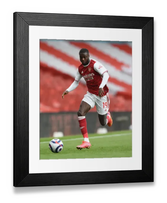 Framed Print : Arsenal's Nicolas Pepe in Action against West Bromwich Albion (2020-21)