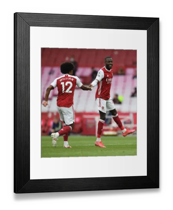 Framed Print : Pepe and Willian Celebrate Arsenal's Win Against West Bromwich Albion (2020-21)