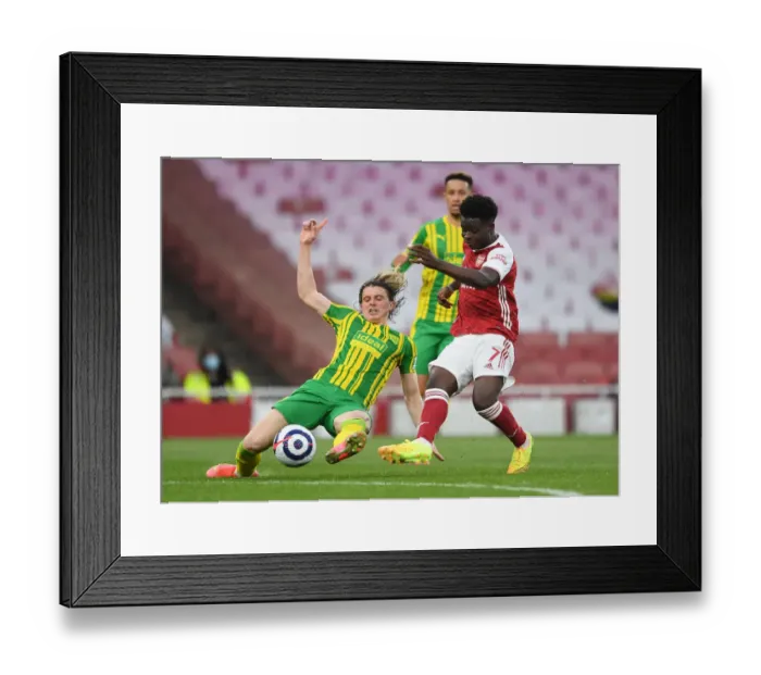 Framed Print : Saka vs. Gallagher: Empty Emirates Battle - Arsenal vs. West Bromwich Albion (2020-21)
