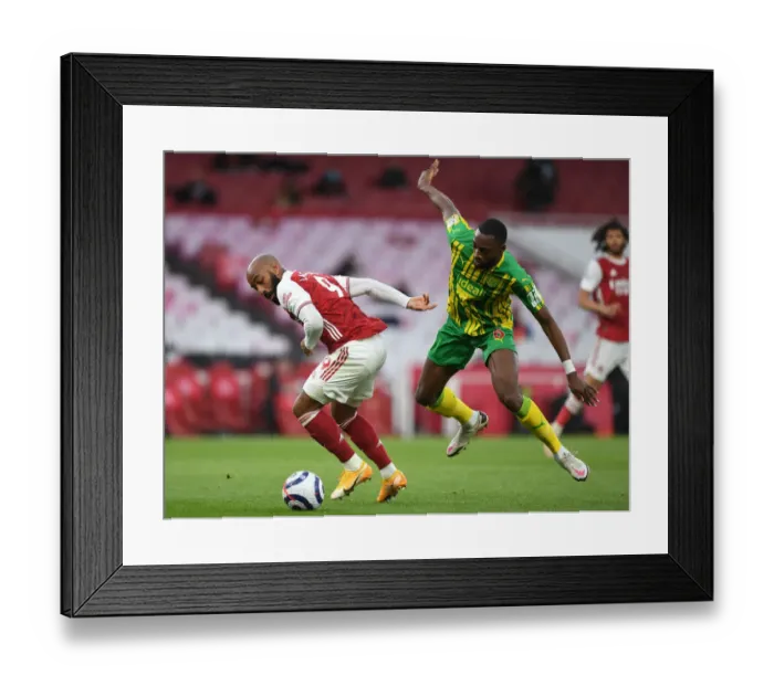Framed Print : Empty Battle: Lacazette vs. Ajayi - Arsenal vs. West Bromwich Albion, Premier League 2020-21 (Behind Closed Doors)