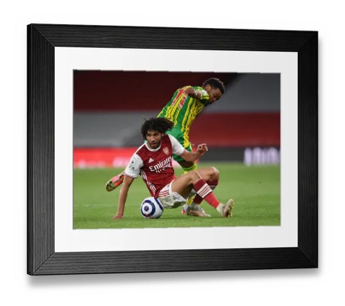 Framed Print : Arsenal's Elneny Wins the Ball in Empty Emirates Stadium: Arsenal vs. West Bromwich Albion (May 2021, Premier League)
