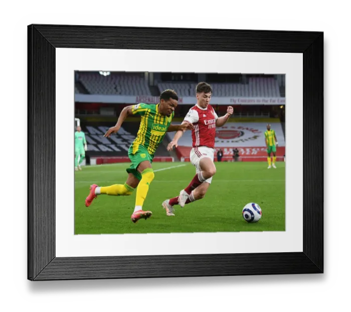 Framed Print : Arsenal's Tierney Stands Out in Empty Emirates: Arsenal vs. West Bromwich Albion, Premier League 2020-21