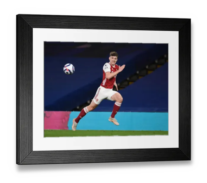 Framed Print : Arsenal's Kieran Tierney at Empty Stamford Bridge: 2021 Premier League Showdown Amid Pandemic Restrictions