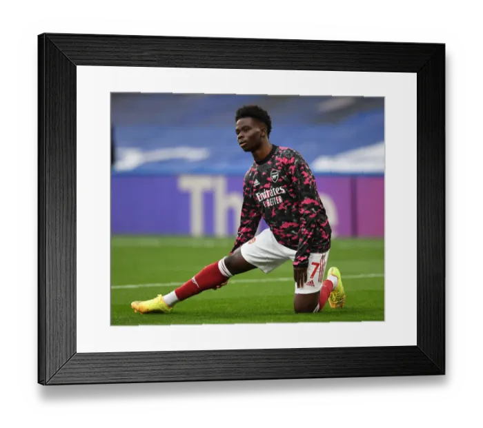 Framed Print : Arsenal's Bukayo Saka Warming Up: Chelsea vs Arsenal, Premier League 2020-21 (Behind Closed Doors) Framed Print : Arsenal's Bukayo Saka Warming Up: Chelsea vs Arsenal, Premier League 2020-21 (Behind Closed Doors)