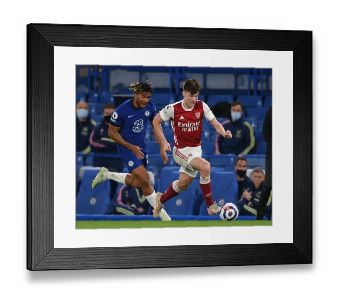 Framed Print : Clash of the Stars: Tierney vs. James - A Premier League Battle at Stamford Bridge, 2021 (Behind Closed Doors)