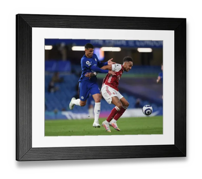 Framed Print : Aubameyang vs. Thiago Silva: A Premier League Battle at Empty Stamford Bridge, 2021