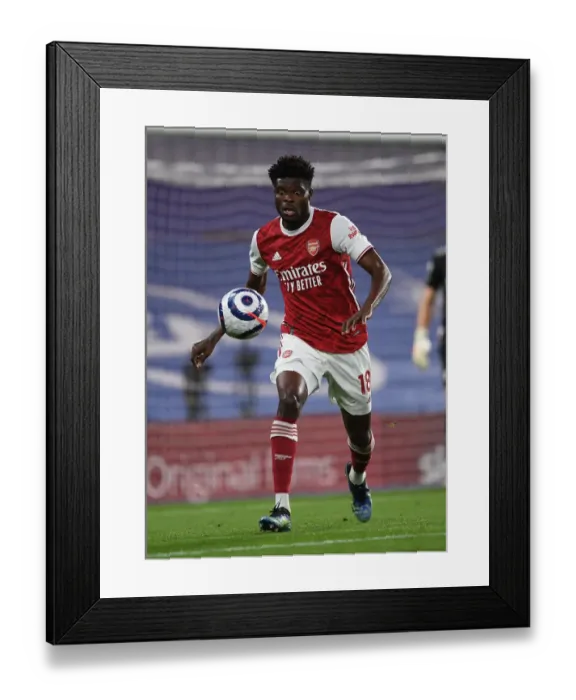 Framed Print : Thomas Partey in Action: Chelsea vs. Arsenal, 2021 Premier League - Behind Closed Doors Framed Print : Thomas Partey in Action: Chelsea vs. Arsenal, 2021 Premier League - Behind Closed Doors