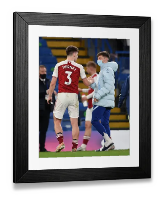 Framed Print : Chelsea vs. Arsenal: Post-Match Chat Between Kieran Tierney and Billy Gilmour Amid Empty Stamford Bridge (Premier League 2020-21)