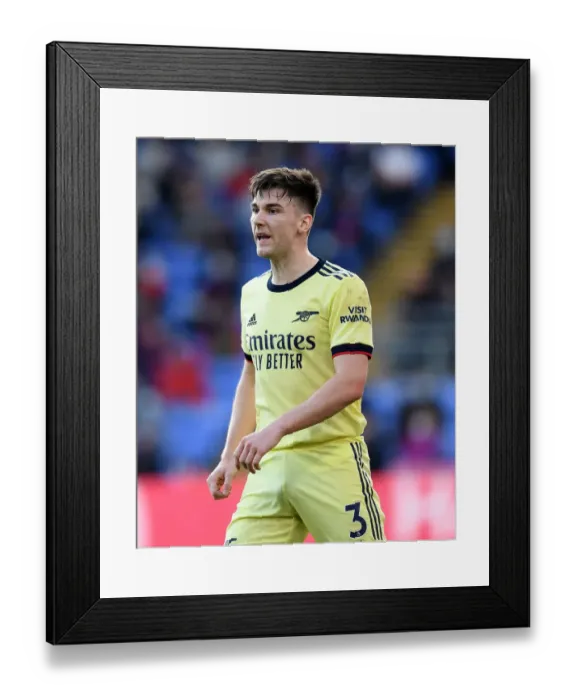 Framed Print : Arsenal's Kieran Tierney Goes Head-to-Head with Crystal Palace in Intense Premier League Clash