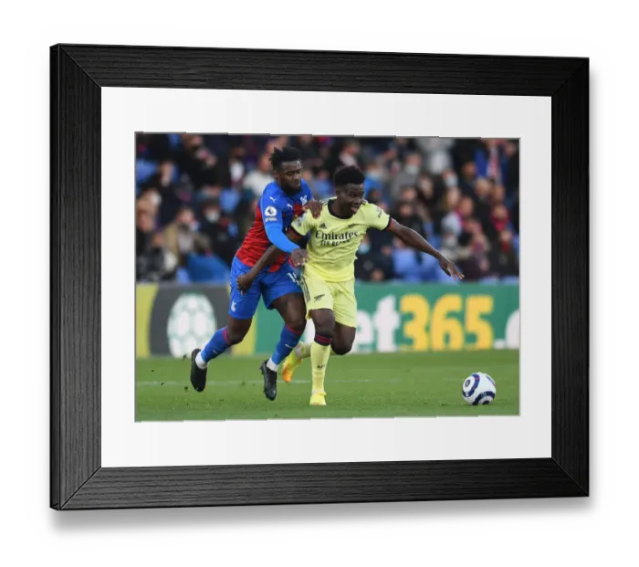 Framed Print : Bukayo Saka vs. Jeffrey Schlupp: Battle at Selhurst Park - Crystal Palace vs. Arsenal, Premier League 2020-21