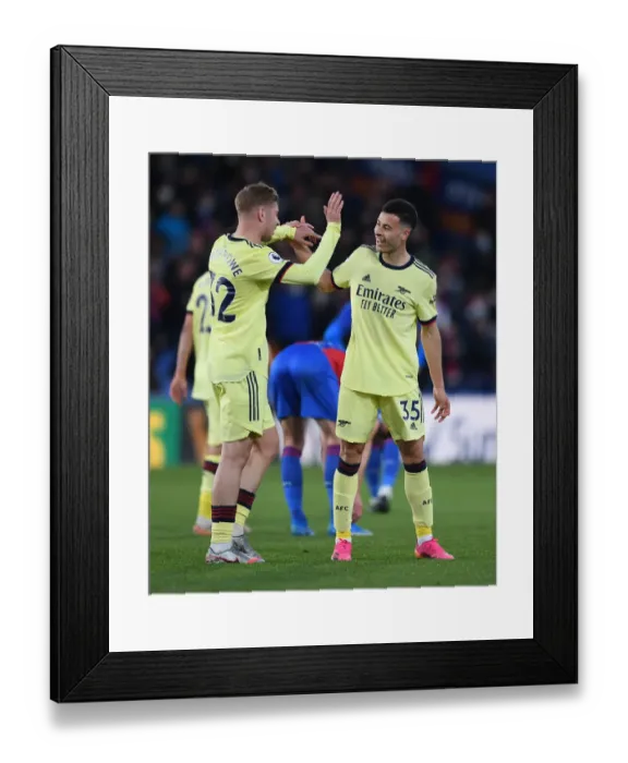 Framed Print : Martinelli and Smith Rowe: Dazzling Duo's Goal Celebration in Arsenal's Victory over Crystal Palace (2020-21)