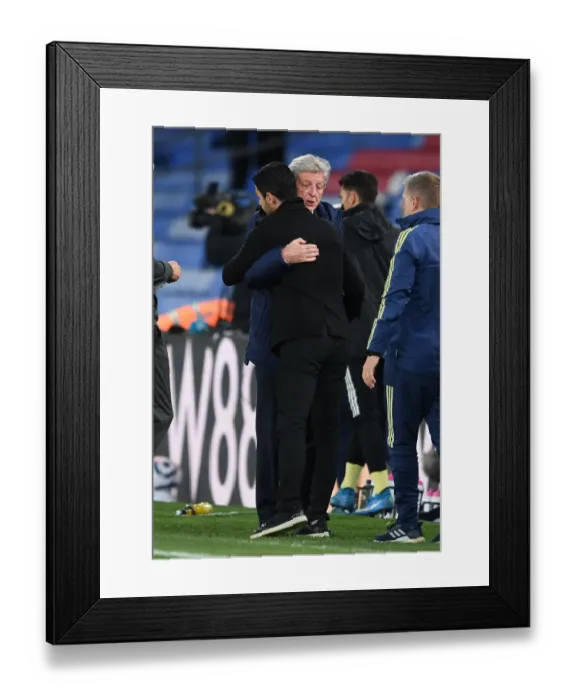 Framed Print : Mikel Arteta and Roy Hodgson Embrace After Crystal Palace vs. Arsenal Premier League Clash Framed Print : Mikel Arteta and Roy Hodgson Embrace After Crystal Palace vs. Arsenal Premier League Clash
