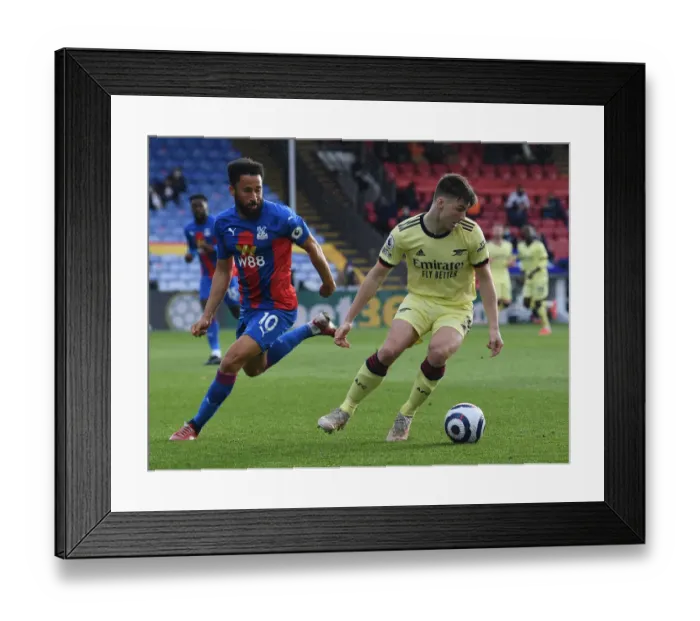 Framed Print : Arsenal's Kieran Tierney Fends Off Andros Townsend Challenge in Crystal Palace Clash