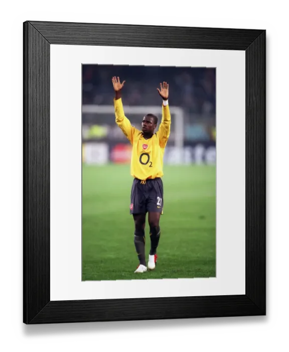Framed Print : Emmanuel Adebayor (Arsenal) celebrates at the final whistle Framed Print : Emmanuel Adebayor (Arsenal) celebrates at the final whistle