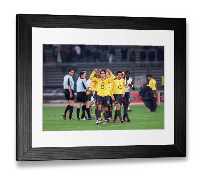 Framed Print : Cesc Fabregas (Arsenal) celebrates at the end of the match Framed Print : Cesc Fabregas (Arsenal) celebrates at the end of the match