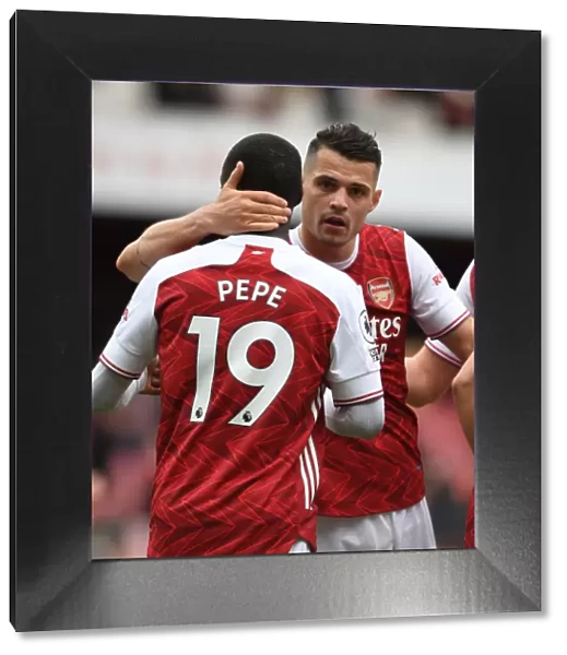 Arsenal Celebrate with Nicolas Pepe and Granit Xhaka: Arsenal v Brighton & Hove Albion, Premier League 2021