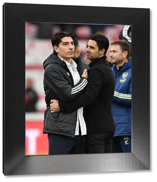 Arsenal Celebrate Premier League Victory: Mikel Arteta and Hector Bellerin's Emotional Reunion at Emirates Stadium