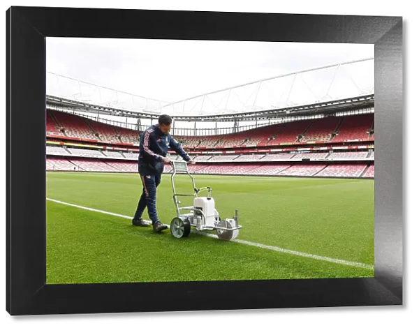 Preparing the Emirates Pitch for Arsenal vs. Brighton: A Return to Football Amidst Easing Coronavirus Restrictions