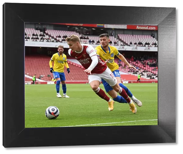 Odegaard vs Moder: Clash of Midfield Talents in Arsenal vs Brighton Premier League Showdown (2020-21)