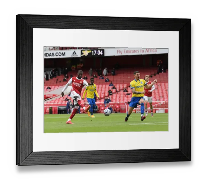 Framed Print : Pepe Scores: Arsenal Secures Victory Against Brighton in Premier League