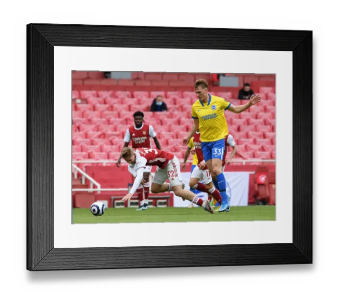 Framed Print : Arsenal vs Brighton: Smith Rowe Fouls by Burn in Intense Premier League Clash (2020-21) Framed Print : Arsenal vs Brighton: Smith Rowe Fouls by Burn in Intense Premier League Clash (2020-21)