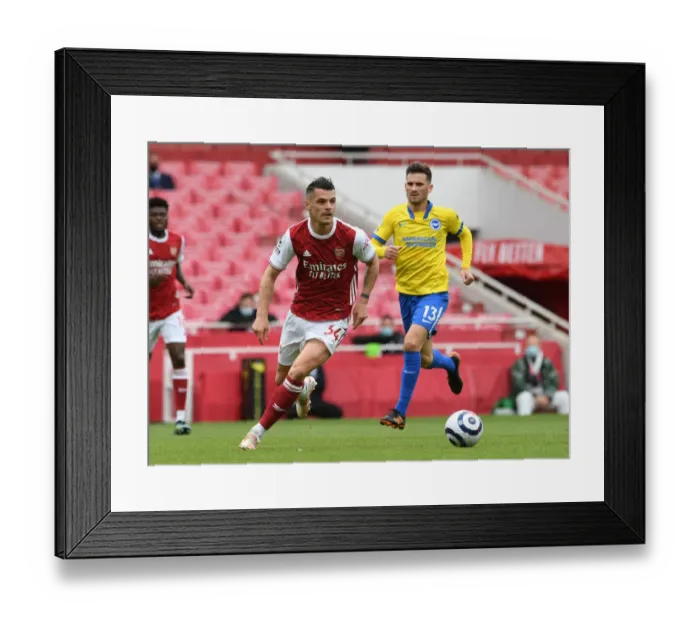 Framed Print : Granit Xhaka: Arsenal vs Brighton & Hove Albion (2020-21) - In Action Framed Print : Granit Xhaka: Arsenal vs Brighton & Hove Albion (2020-21) - In Action