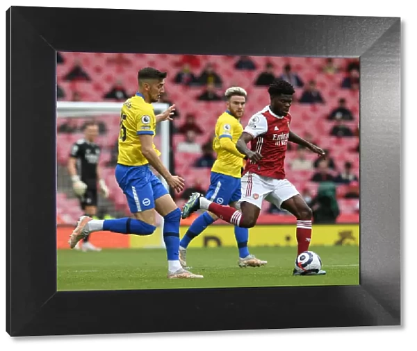 Arsenal vs Brighton: Thomas Partey Clashes with Jakub Moder in Premier League Showdown (2020-21)