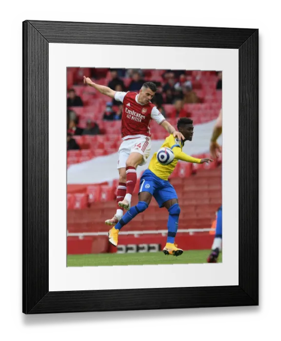 Framed Print : Arsenal vs. Brighton & Hove Albion: Xhaka vs. Bissouma Clash in Premier League Showdown Framed Print : Arsenal vs. Brighton & Hove Albion: Xhaka vs. Bissouma Clash in Premier League Showdown