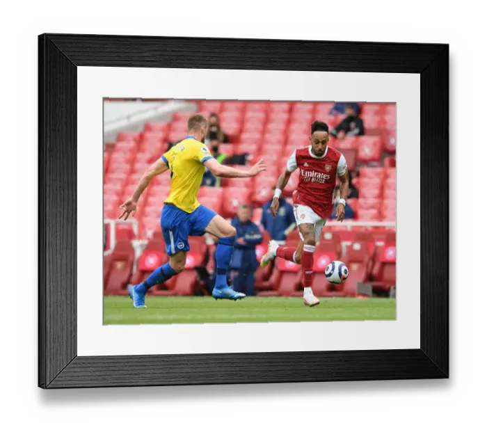 Framed Print : Aubameyang vs. Webster: Battle of the Stars in Arsenal vs. Brighton Premier League Clash (2020-21)