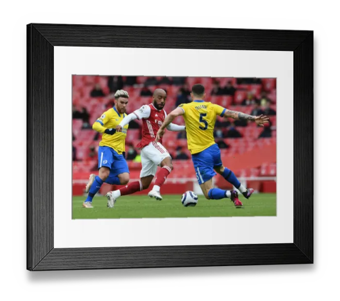 Framed Print : Arsenal vs Brighton: Lacazette vs Dunk Clash in Premier League Showdown Framed Print : Arsenal vs Brighton: Lacazette vs Dunk Clash in Premier League Showdown