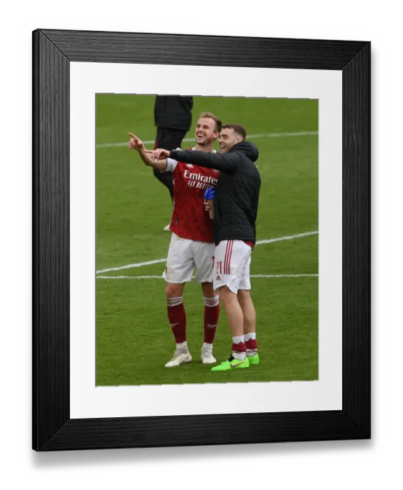 Framed Print : Arsenal's Holding and Chambers: Savoring Success Against Brighton in the 2020-21 Premier League
