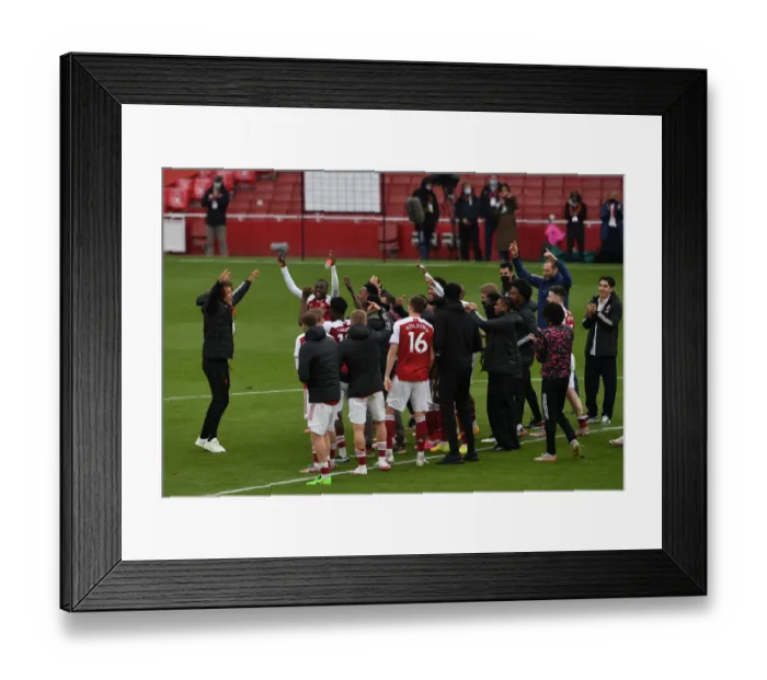Framed Print : Arsenal Celebrate Victory Over Brighton & Hove Albion in Premier League Showdown
