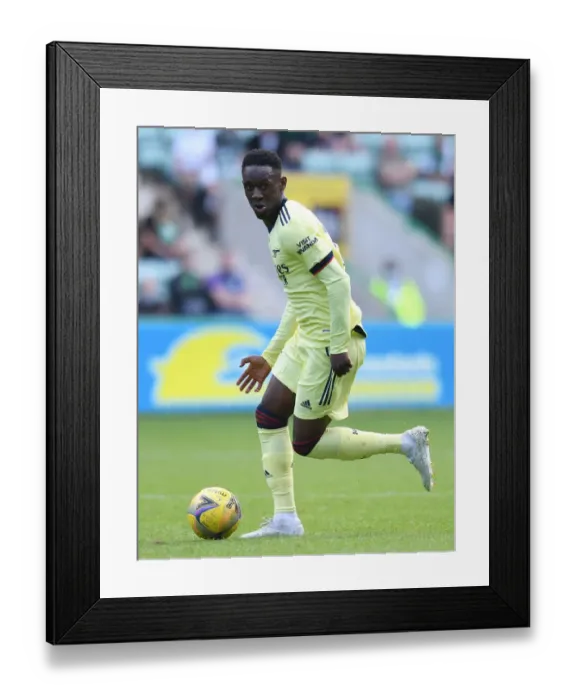 Framed Print : Arsenal's Flo Balogun in Action during Hibernian Pre-Season Friendly Framed Print : Arsenal's Flo Balogun in Action during Hibernian Pre-Season Friendly