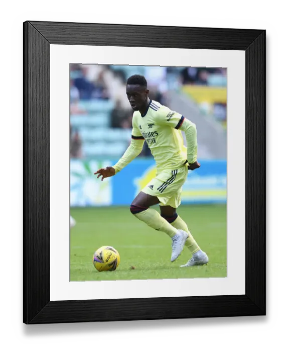 Framed Print : Arsenal's Flo Balogun in Action during Hibernian Pre-Season Friendly Framed Print : Arsenal's Flo Balogun in Action during Hibernian Pre-Season Friendly