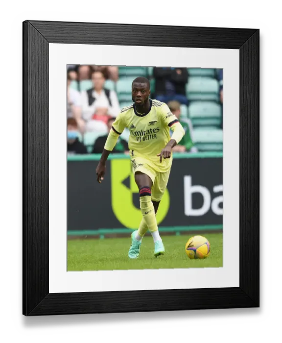 Framed Print : Arsenal's Nicolas Pepe in Action: Hibernian Friendly, Edinburgh 2021 Framed Print : Arsenal's Nicolas Pepe in Action: Hibernian Friendly, Edinburgh 2021