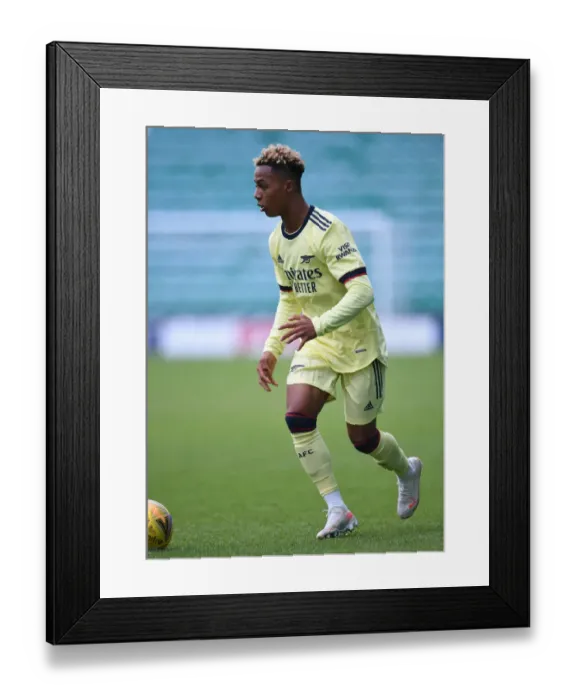Framed Print : Arsenal's Omari Hutchinson in Action during Hibernian Friendly