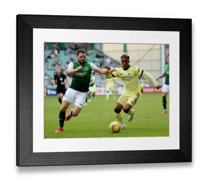 Framed Print : Arsenal's Omari Hutchinson Shines in Hibernian Friendly Framed Print : Arsenal's Omari Hutchinson Shines in Hibernian Friendly