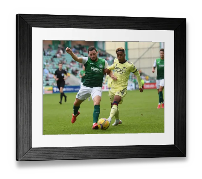 Framed Print : Omari Hutchinson Stars: Arsenal Secure Pre-Season Victory Over Hibernian