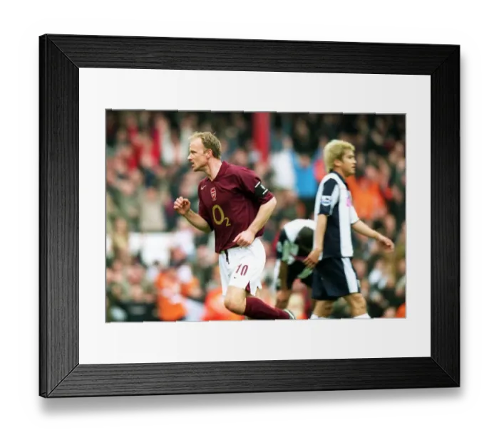 Framed Print : Dennis Bergkamp's Triumphant Goal: Arsenal's Third Strike Against West Bromwich Albion