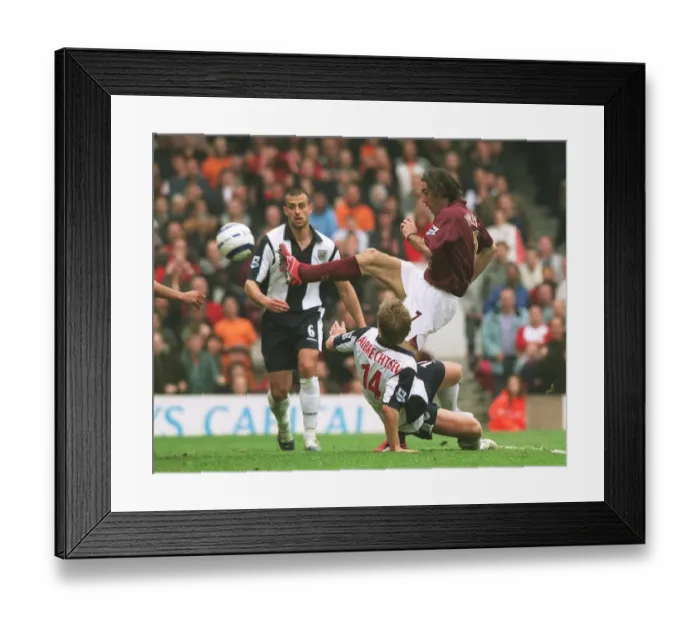 Framed Print : Robert Pires shoots past West Brom goalkeeper Tomasz Kuszczak to score the 2nd Arsenal goal