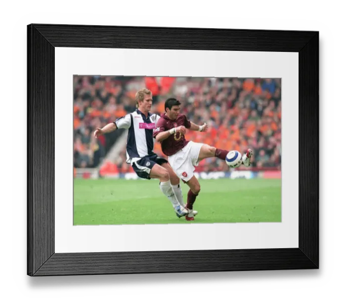 Framed Print : Jose Reyes (Arsenal) Martin Albrechtsen (West Brom)