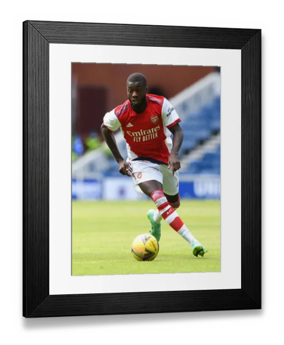 Framed Print : Nicolas Pepe in Action: Arsenal vs Rangers Pre-Season Friendly, Glasgow 2021