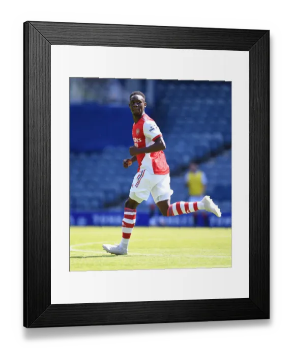 Framed Print : Arsenal's Flo Balogun Faces Off Against Rangers at Ibrox Stadium: Pre-Season Clash Framed Print : Arsenal's Flo Balogun Faces Off Against Rangers at Ibrox Stadium: Pre-Season Clash