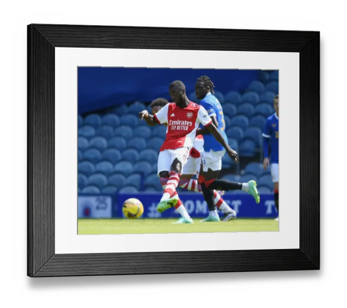 Framed Print : Arsenal's Nicolas Pepe in Action against Rangers during 2021 Pre-Season Friendly in Glasgow
