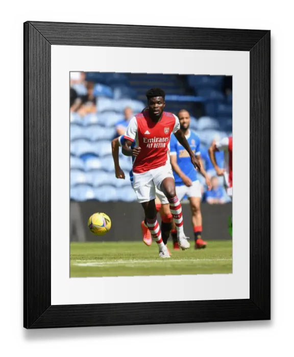 Framed Print : Thomas Partey in Action: Arsenal vs Rangers Pre-Season Clash at Ibrox Stadium, 2021 Framed Print : Thomas Partey in Action: Arsenal vs Rangers Pre-Season Clash at Ibrox Stadium, 2021