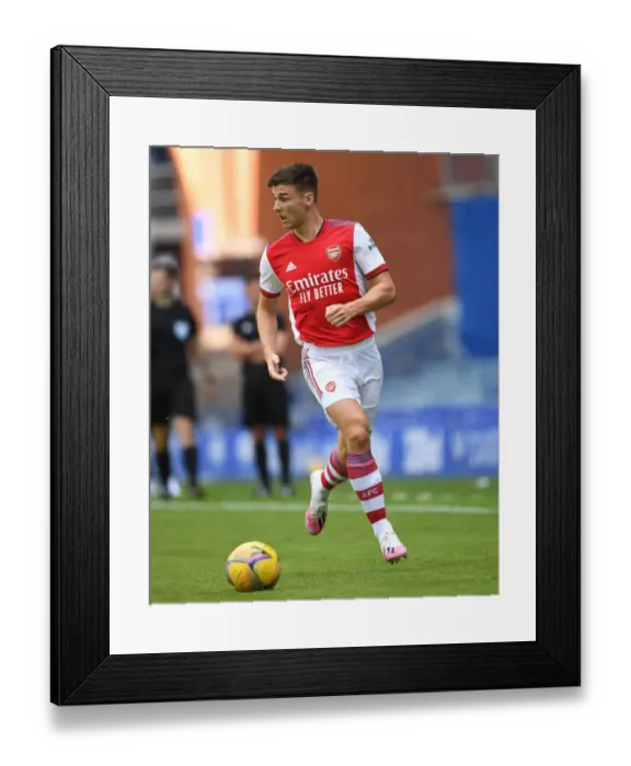 Framed Print : Arsenal's Kieran Tierney in Action Against Rangers at Ibrox Stadium