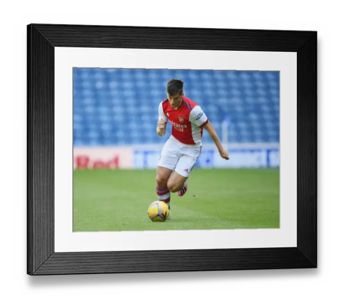 Framed Print : Arsenal's Kieran Tierney in Action Against Rangers at Ibrox Stadium