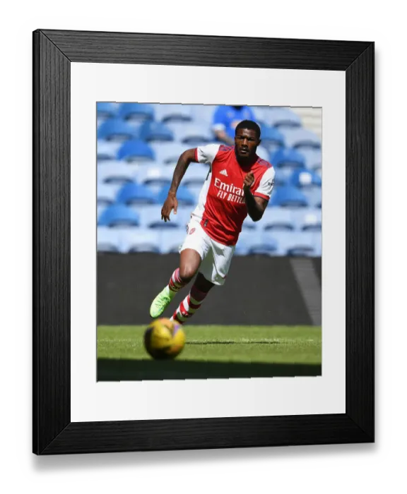 Framed Print : Arsenal's Ainsley Maitland-Niles in Action during Pre-Season Friendly against Rangers (2021-22)