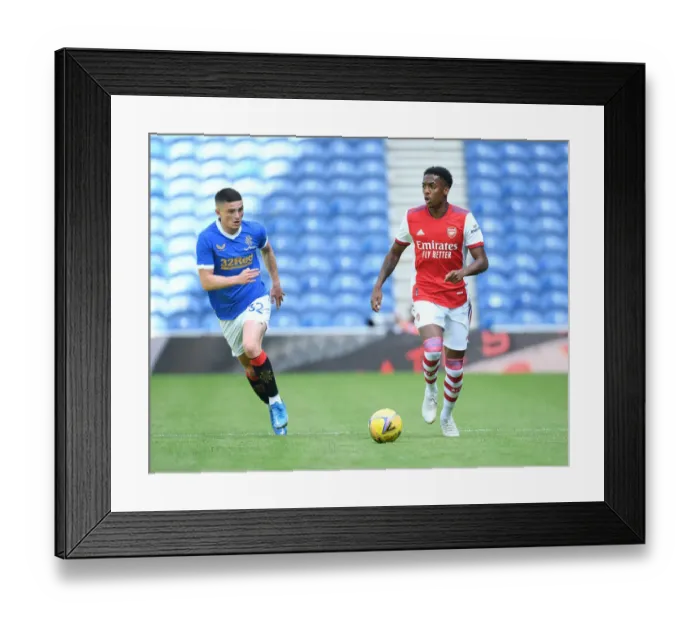 Framed Print : Joe Willock Clashes with Jake Hastie: Rangers vs. Arsenal Pre-Season Friendly, Glasgow 2021
